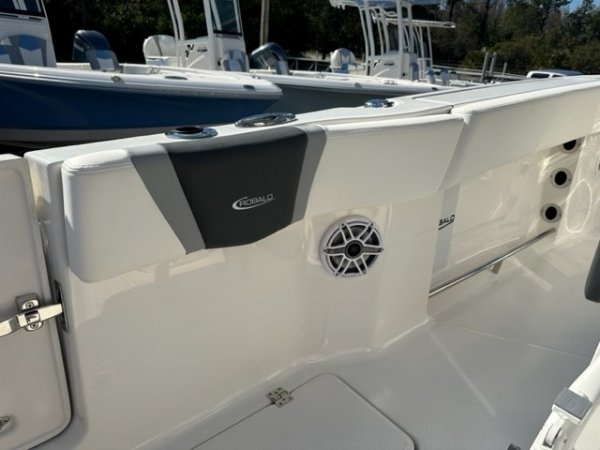 The definition of an outboard motor is a detachable engine mounted on outboard brackets on the stern of your boat.  This configuration will have triple engines.