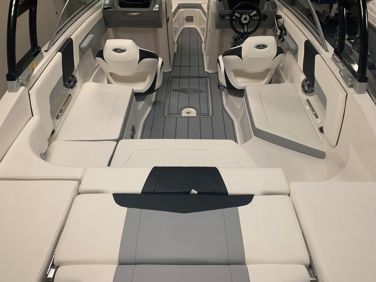 A bow rider is a boat with an open bow area where there are extra seats in front of the windshield.  Bow riders are typically between 17' and 30'long. They are well suited for many recreational water sports such as tubing, water skiing, and swimming.