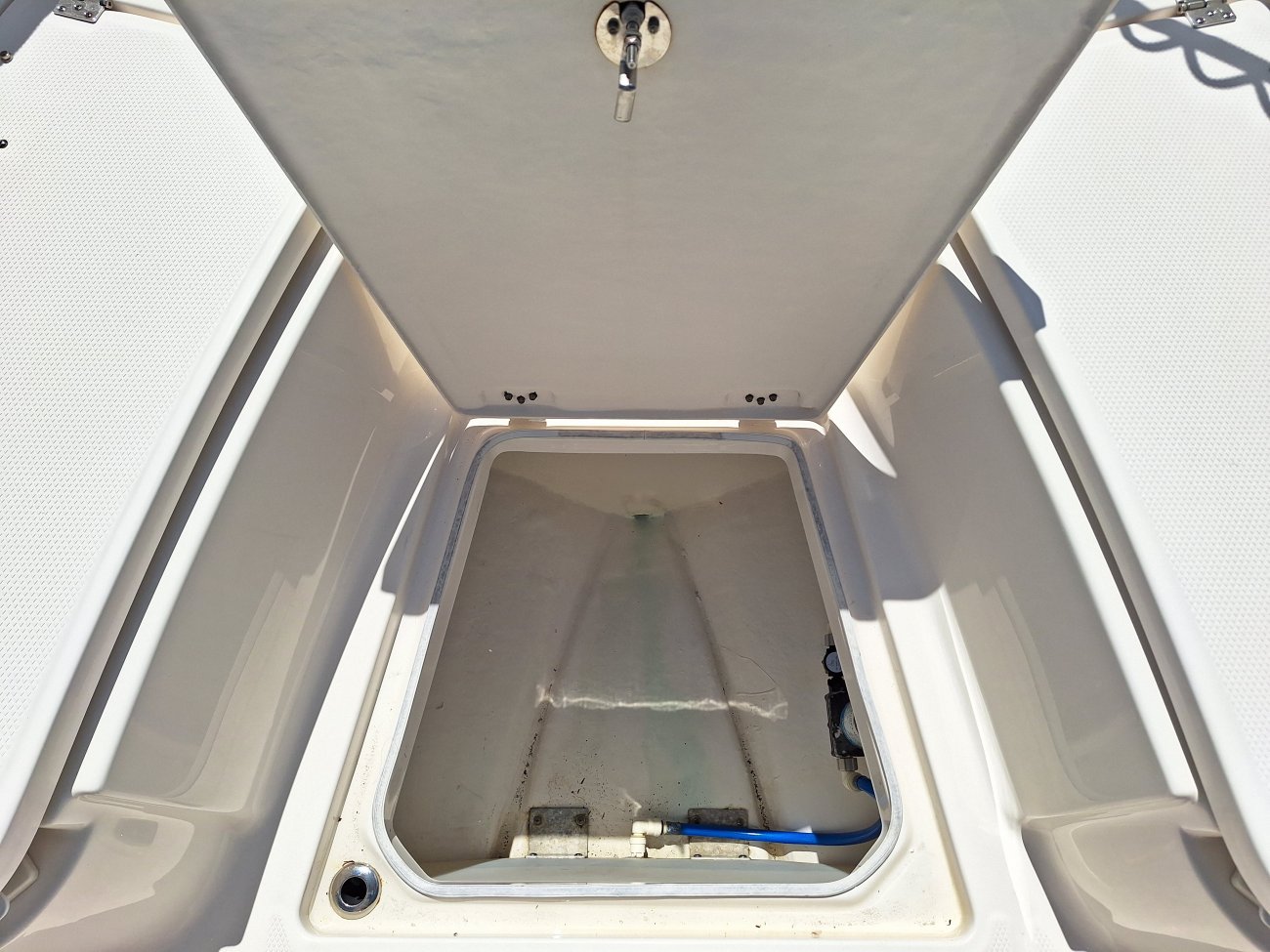 The definition of an outboard motor is a detachable engine mounted on outboard brackets on the stern of your boat.  This configuration will have triple engines.