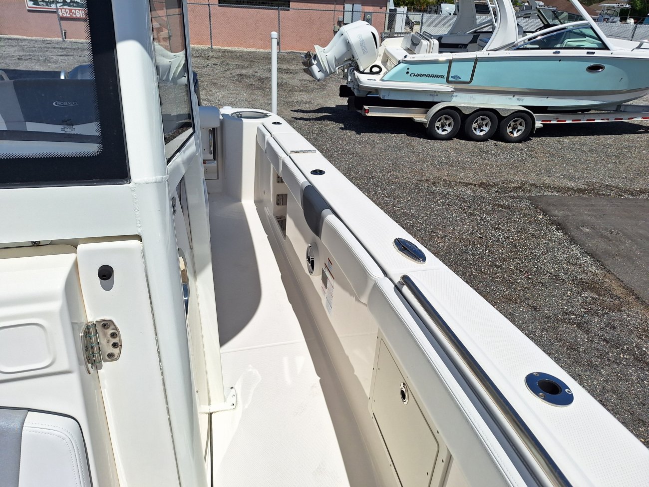 Center console is an open hull boat where the console of the boat is in the center. The boat deck surrounds the console so that a person can walk all around the boat from stern to bow with ease. Most center consoles are powered by outboard motors.