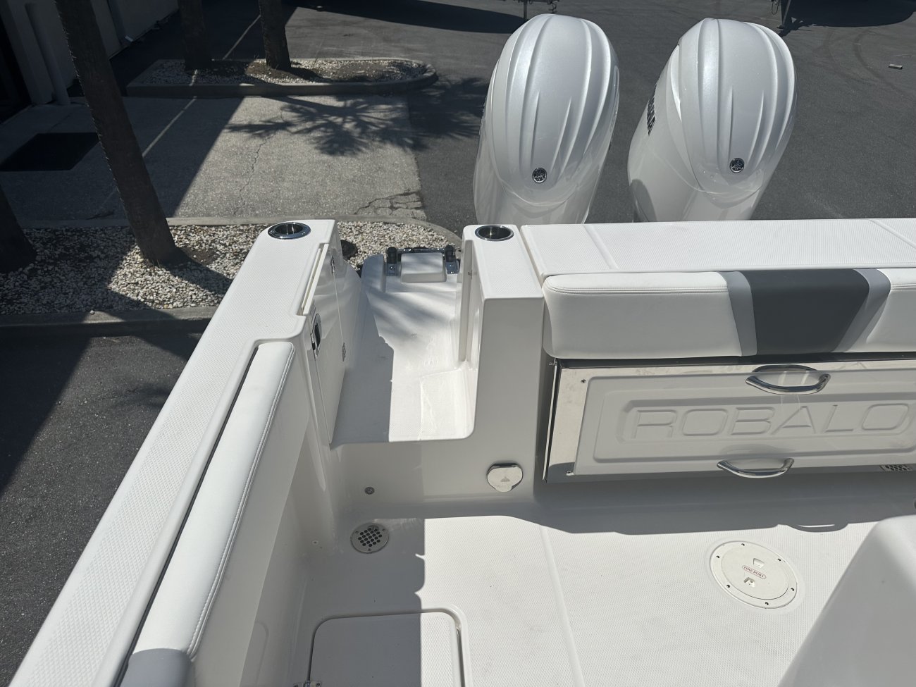 The definition of an outboard motor is a detachable engine mounted on outboard brackets on the stern of your boat.  This configuration will have triple engines.